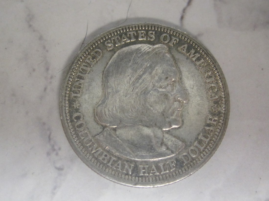 1893 Columbian Worlds Fair Half Dollar: Special commemorative issue, choice about uncirculated