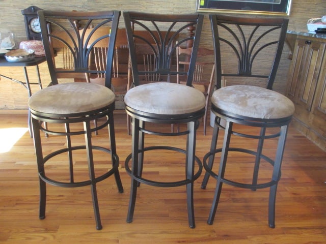 Three Bronzed Metal Swiveling Bar Chairs: 18"dia, microfiber seats and wood top rails, seat need some slight spot cleaning, Local Pickup Only