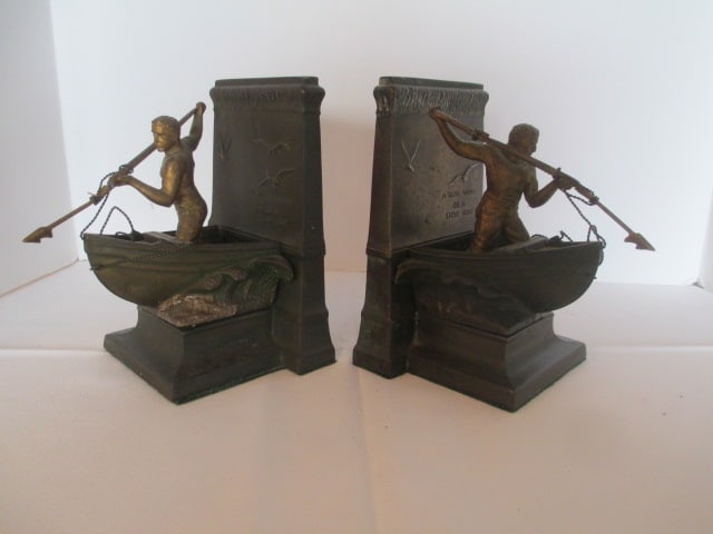 Pair of Vintage Bronze "A Dead Whale or a Stove Boat" Whaler Bookends: 7"h, back reads "In honor of the Whalean whose skill hardihood and daring brought fame and fortune to New Bedford and made it's name known in every seaport of the globes", both harpoons are broken