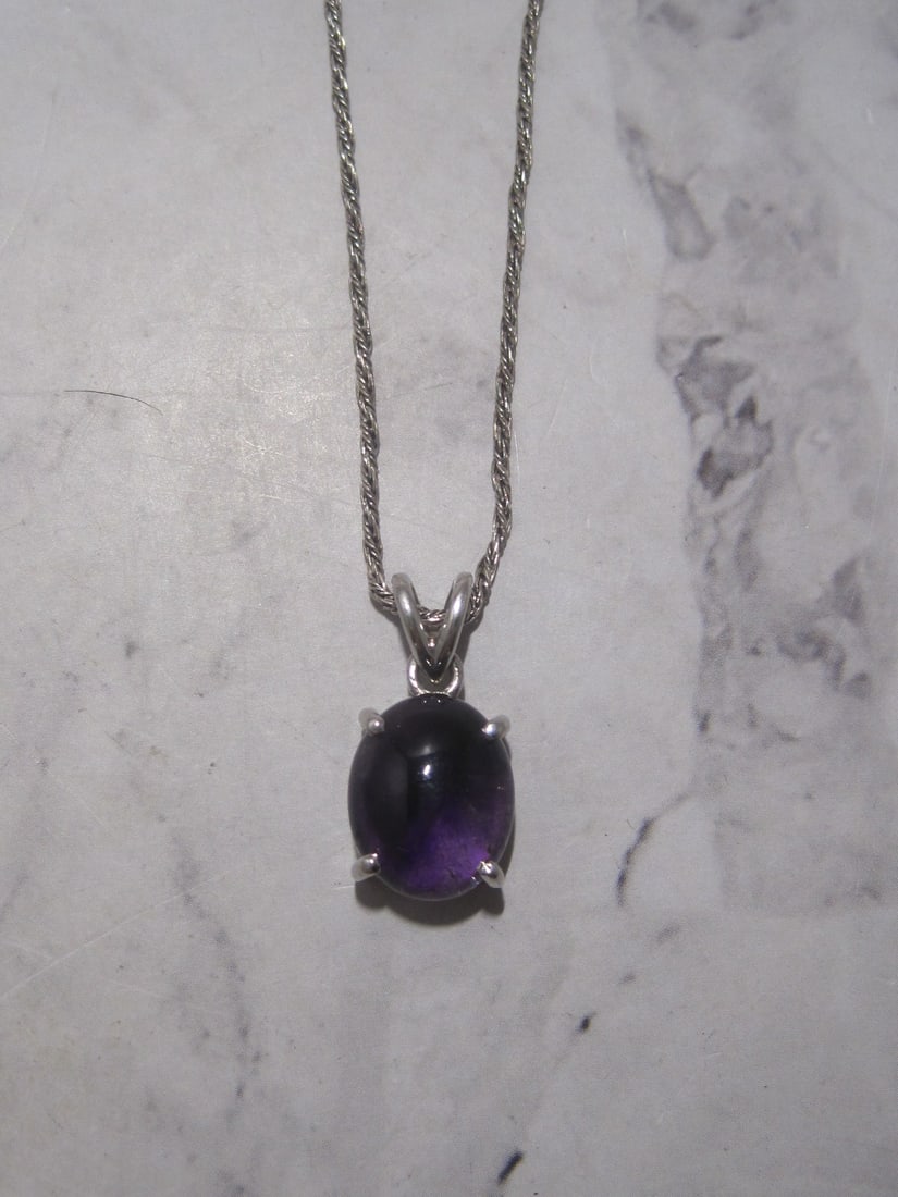 Sterling Silver Amethyst Pendant & Chain: Weighs 5.5 grams, Oval rich gem on 18" sterling silver chain 