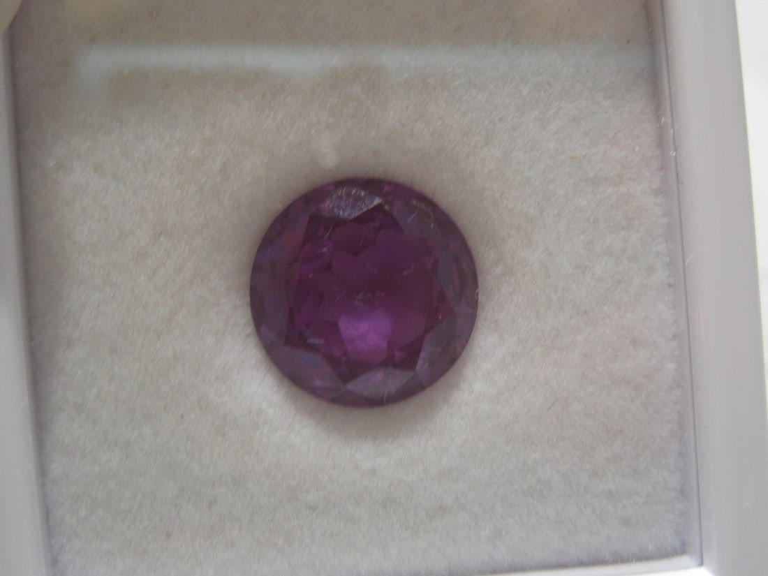 Amethyst: 6.7 c arats, 11.8mm round, rich vivid color gem