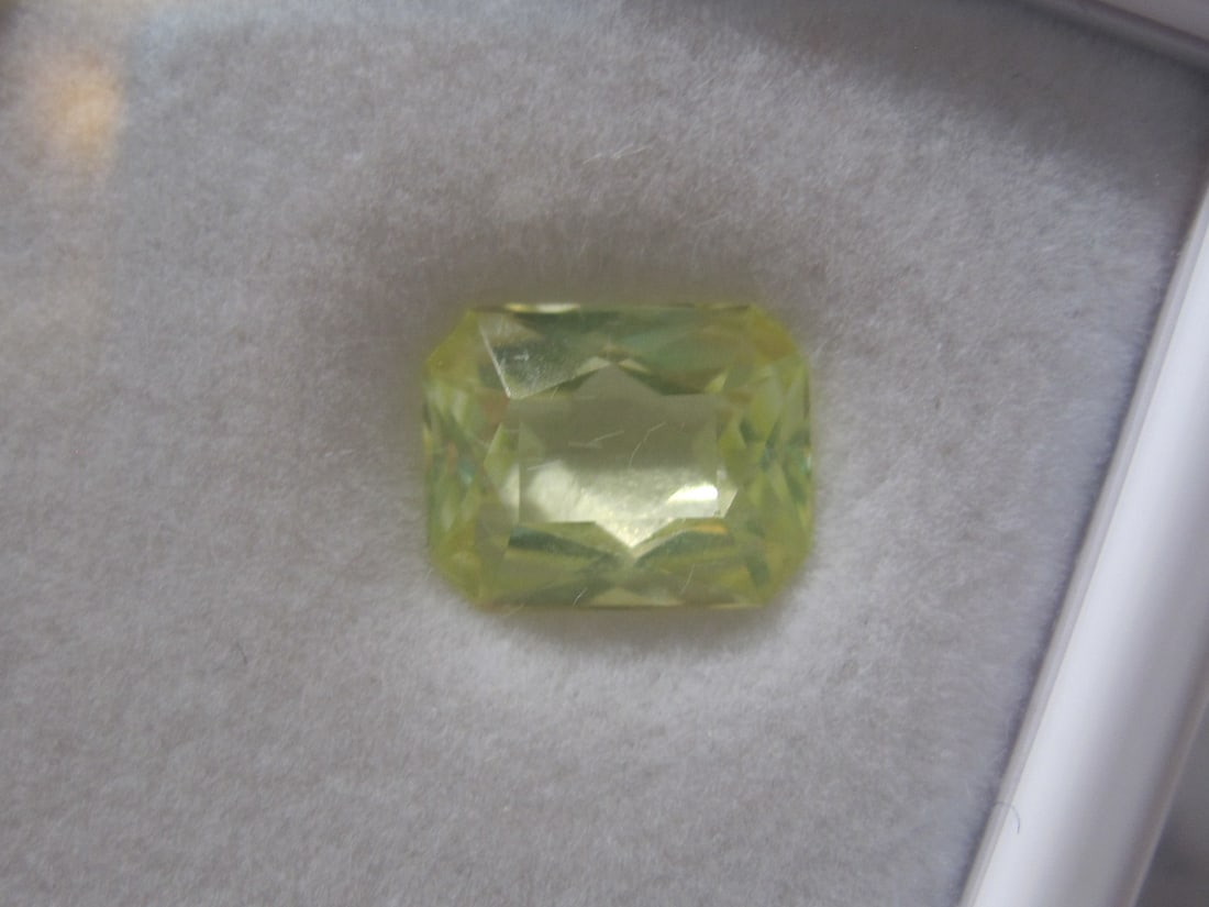 Natural Lime Green Spinel: 3.4 carats, 10x8mm, emerald cut 