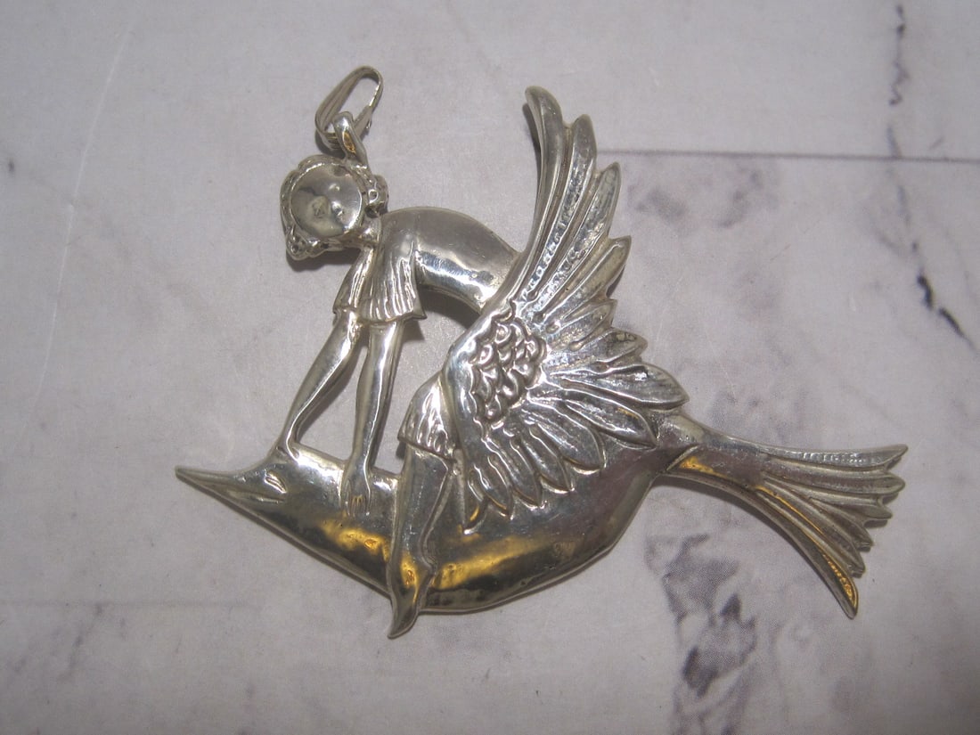Sterling Silver Lady Upon Bird Pendant: Weighs 8 grams, Art Nouveau style 