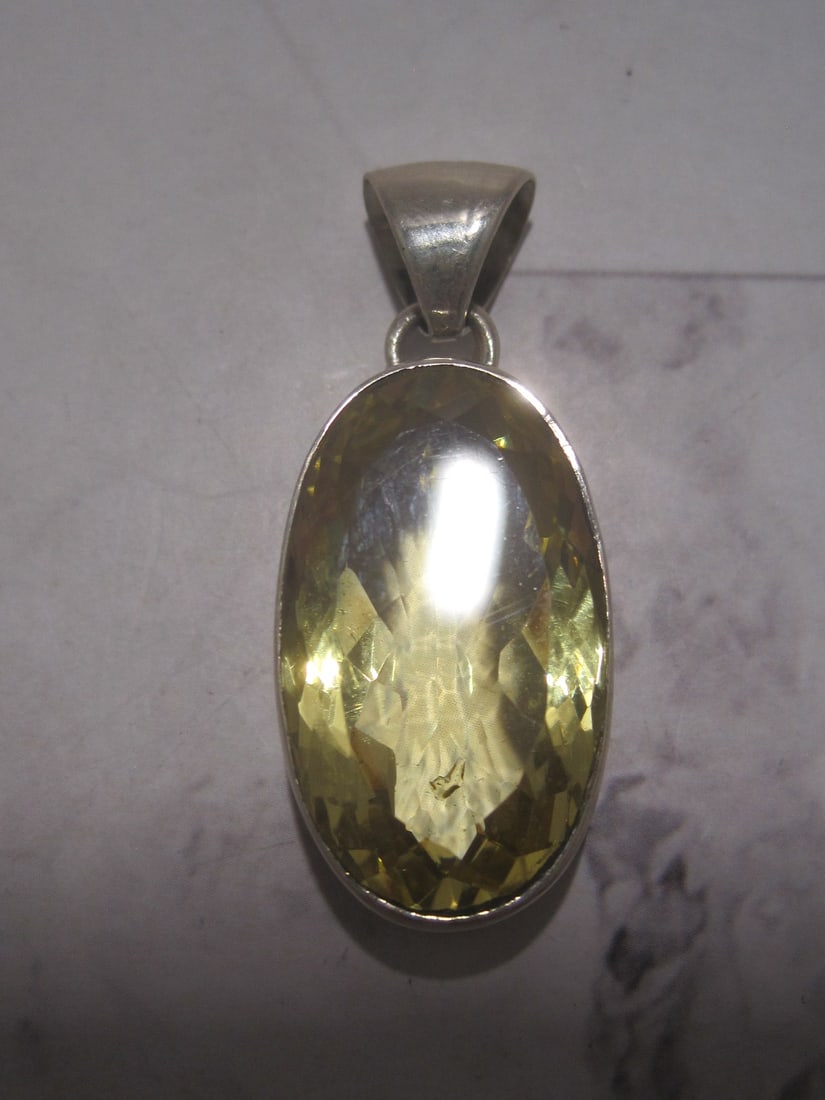 Sterling Silver Large Lemon Quartz Pendant: Weighs 12 grams, approx. 40 carat oval gem