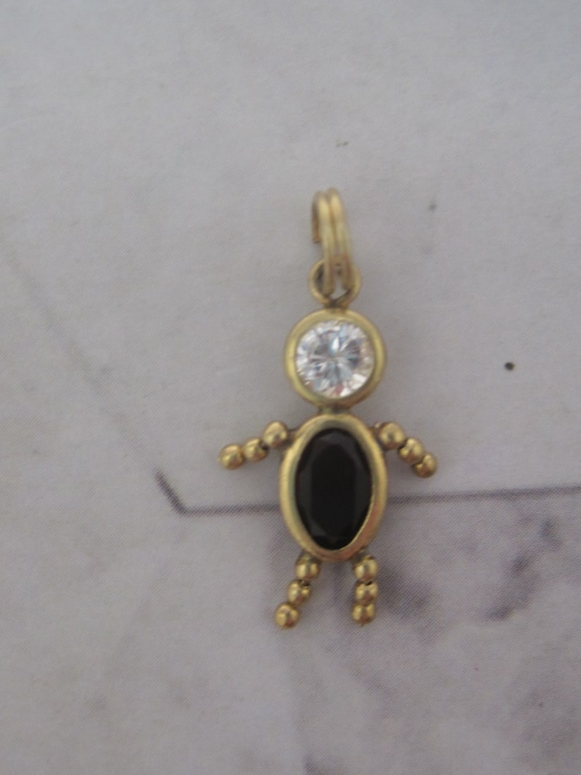 14k Gold Garnet Figural Person Charm: Weighs 0.5 gram, 1", January birthstone 