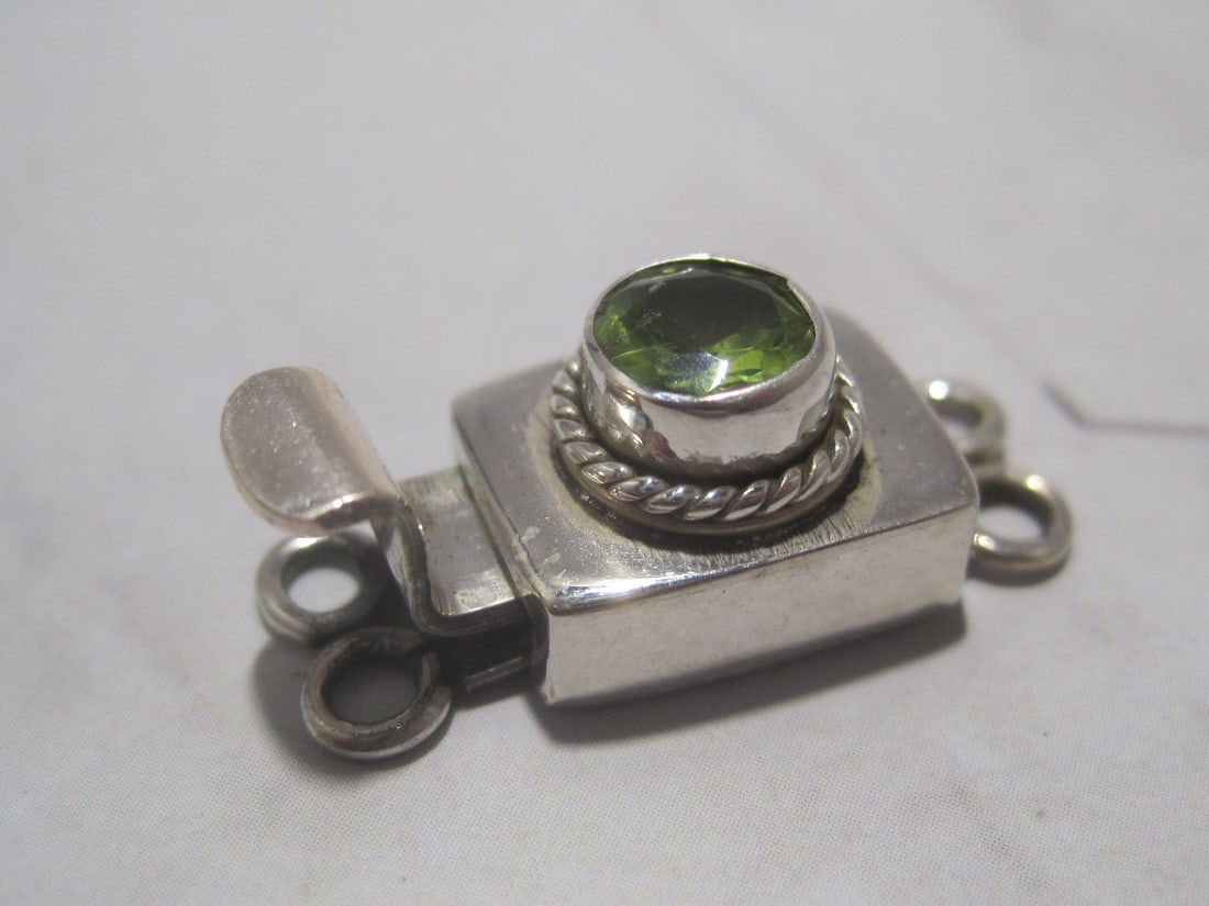 Sterling Silver & Peridot Clasp: Weighs 3.9 grams, 7/8" x 3/8" 