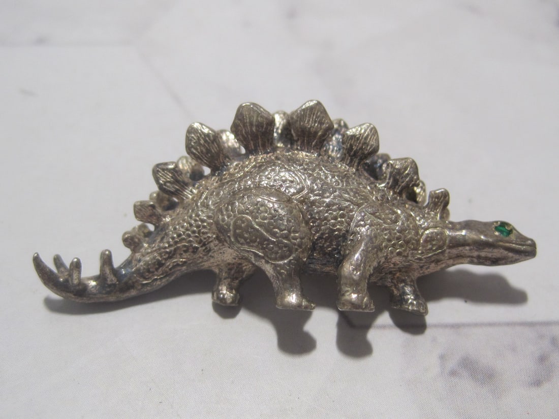 Sterling Silver Gorham Stegosaurus Dinosaur Pin: Weighs 7.4 grams, Emerald eyes, signed