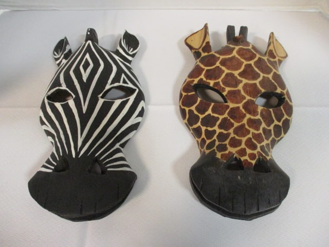 Kenya Artisan Carved Giraffe and Zebra Plaques: 10"h, sticker "Authentically African Hand Carved by the Craftsman of Kenya" 