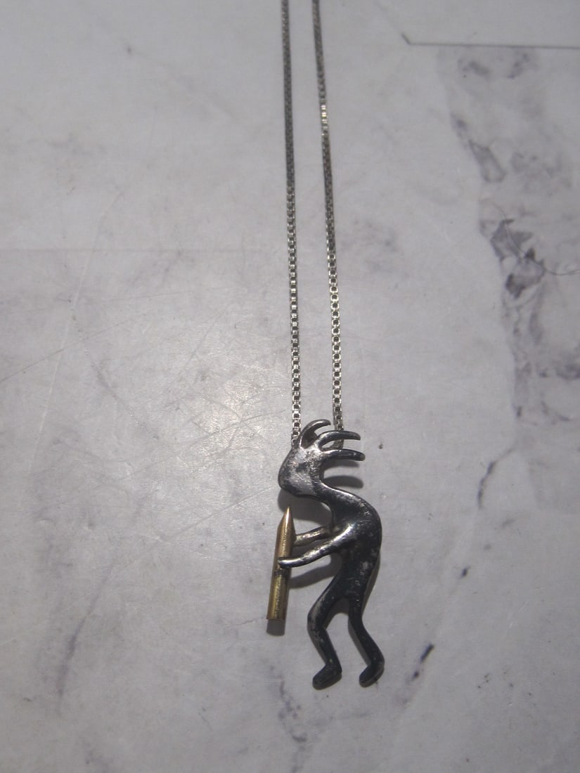 Sterling Silver Two Tone Kokopelli Pendant on 28" Sterling Silver Chain: Weighs 6.9 grams 