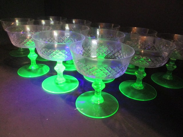 13 Green Uranium/Vaseline Footed Depression Glass Dotted Diamond Sherbet/Champagnes: 4"h, one has small flea bite 