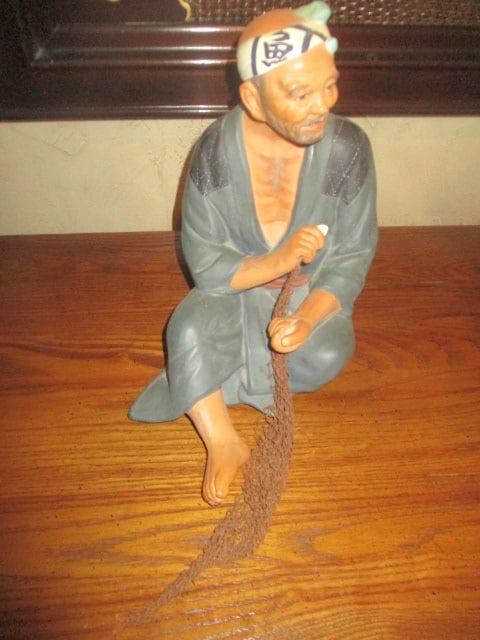 Vintage Japanese Hakata Urasaki Sitting Fisherman Holding Net Doll: 9 1/2"h 