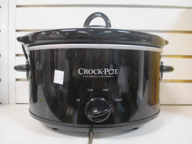 Black Oval Crock Pot: . 