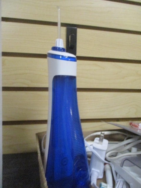 Lot of Electric WaterPik, Toothbrush, and Pack of Toothbrushes - 3