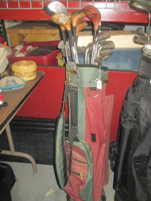 Vintage Golf Bag with Iron Golf Club Set, Wood Drivers, and Extra Clubs (1 of 3)