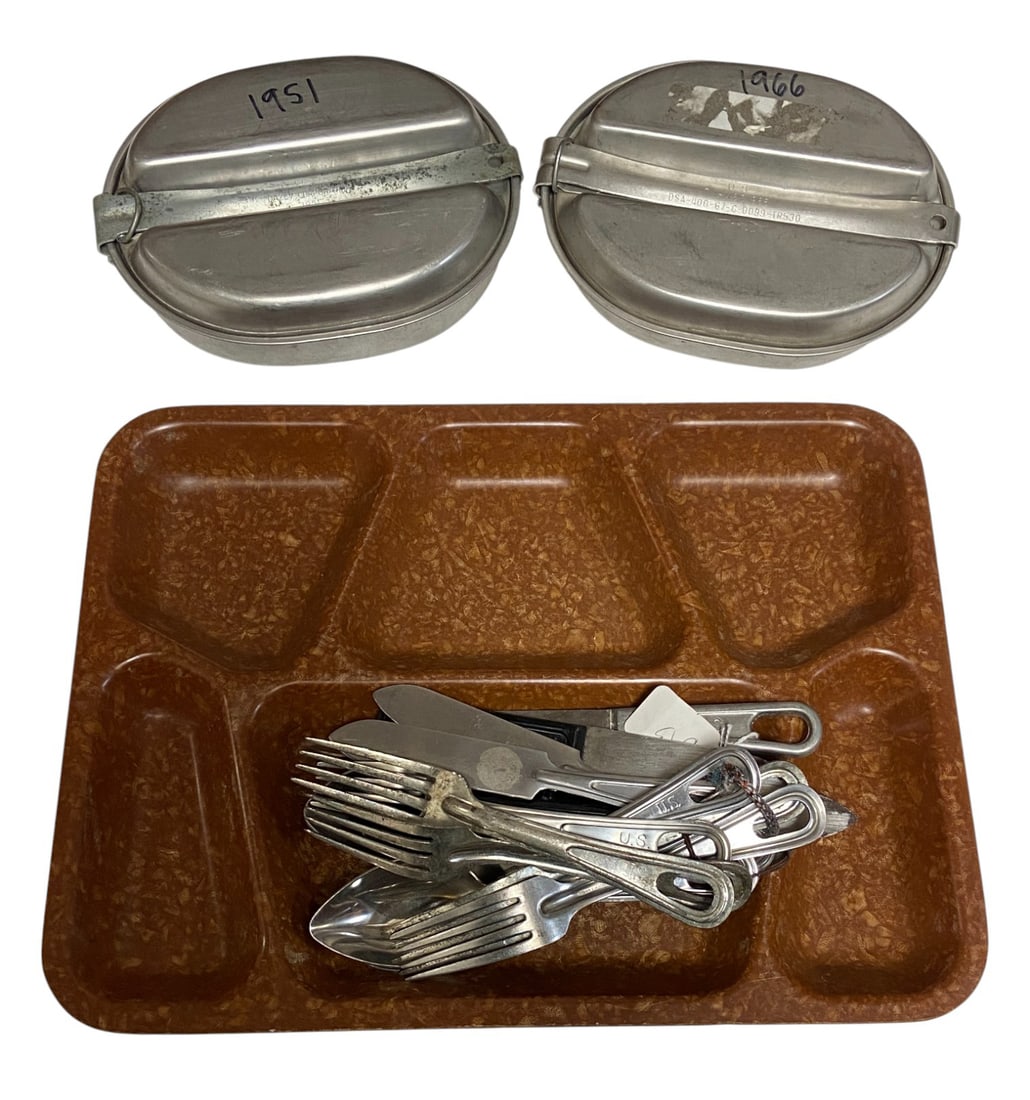 WWII and Post War Mess Set: 1966 Mess Tin, 1951 Mess Tin, (7) WWII Mess Knives, (5) Mess Forks, (5) Mess Spoons, and 1945 USAMD Mess Tray.