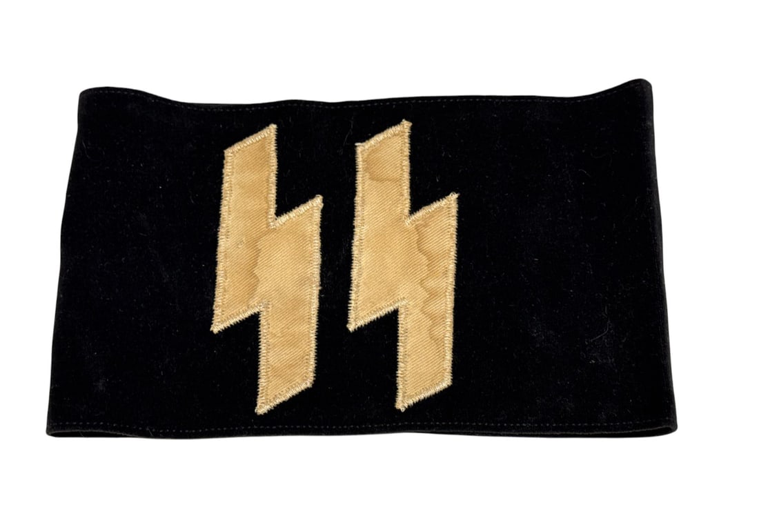 German WWII SS Armband with RZM Tag: Does not glow under blacklight. Has RZM tag intact. See photos. Buyer be your own judge of authenticity.