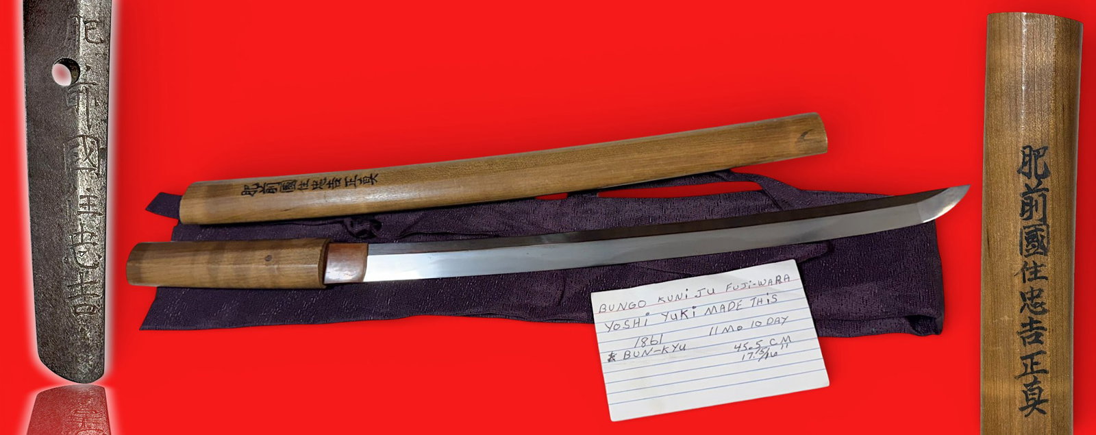 Japanese Edo-Period Wakizashi Sword — Gimei Signature, Shirasaya Mounts: Shinto-period wakizashi in wooden shirasaya mounts. The blade bears a signature purporting to be Hizen no Kuni Ju Tadayoshi; however, the signature is considered gimei (a false or later-added signatur