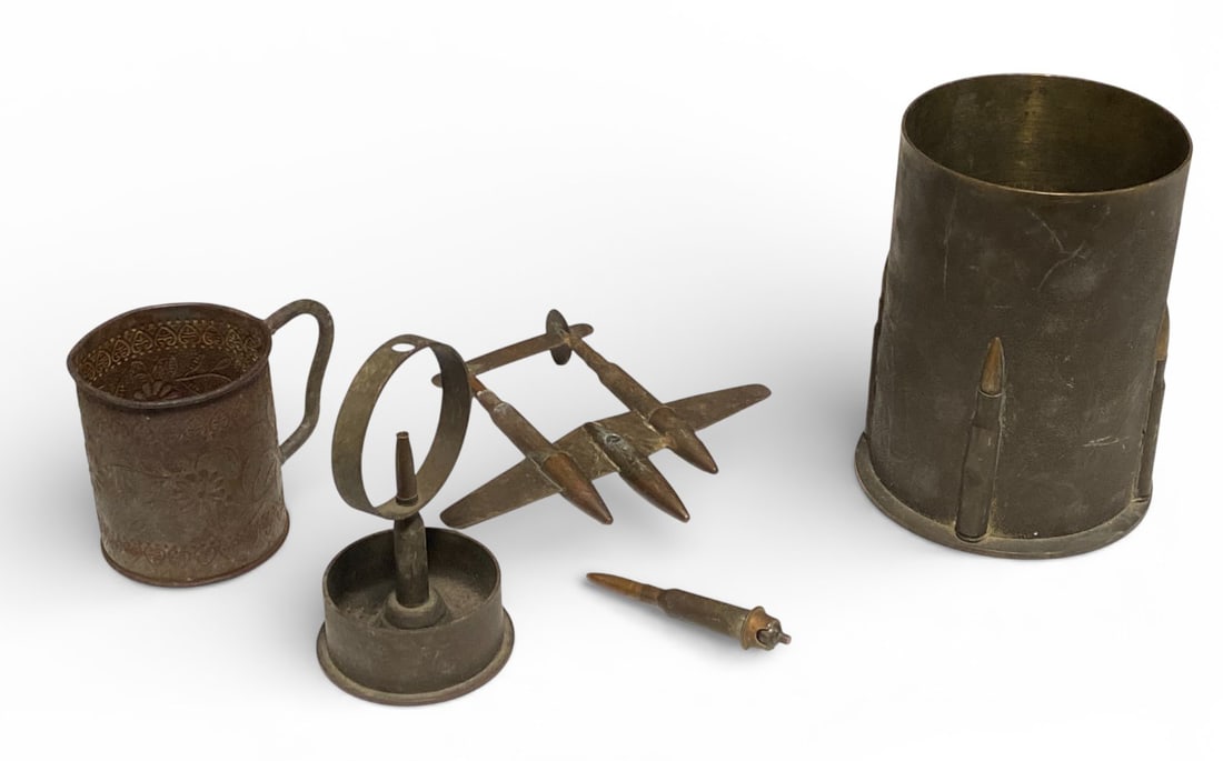 WWII Artillery Trench Art: Japanese Shell Trench art of a plane, Japanese Cup Trench Art, and Artillery shell Trench Art