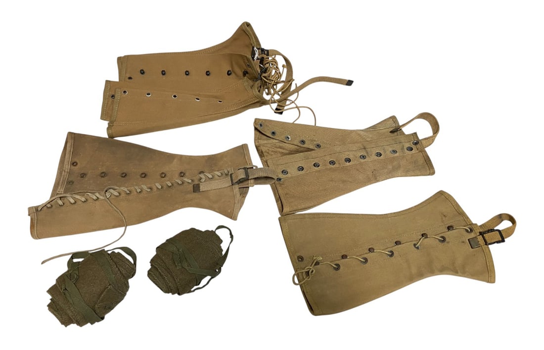 (5) Canvas Leggings/Gaiters and (2) Leg Wraps : See photos. One pair of leggings is dated 1945, in excellent condition. Three WWI era faded, marked leg wraps- two with string and one without