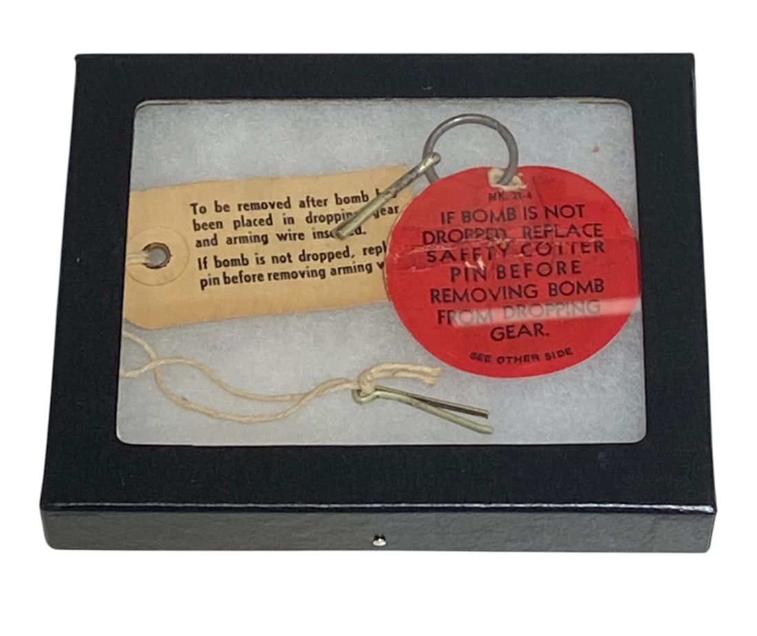 WWII Remove Safety Pin Tags Before Dropping Bomb: See Photos