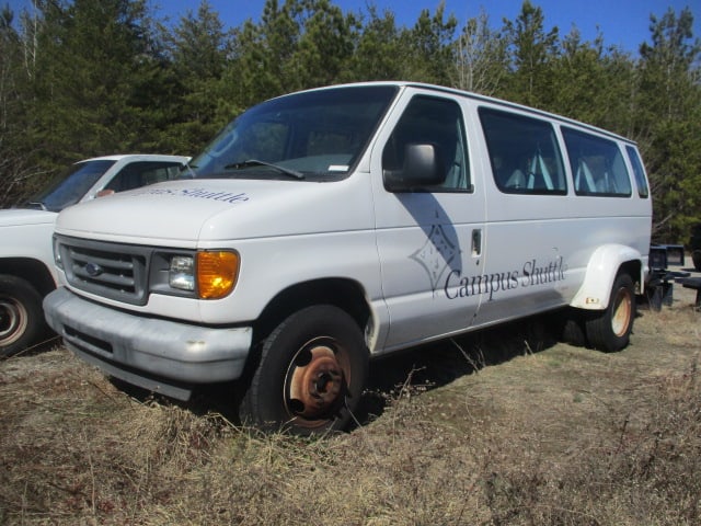 2004 Ford E-Series E-350 XL Super Duty Dual Axel Passenger Van: Clear Title, VIN #1FBSS31L04HA20399, Odometer reads 100,504.5 miles, Van was driven from Campus to Warehouse, Cranks and runs-see video for operation, Per Maintenance Dept. has noise in rear end,