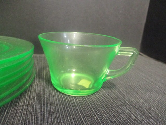 Uranium Glass Saucers (6-6 1/2") & 2 Cups - 2