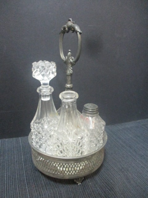 Castor Cruet Set in Caddy: 1 Bottle missing lid 