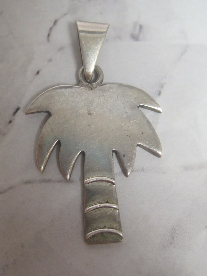 Sterling Silver Palm Tree Pendant: Weighs 12.3 grams 