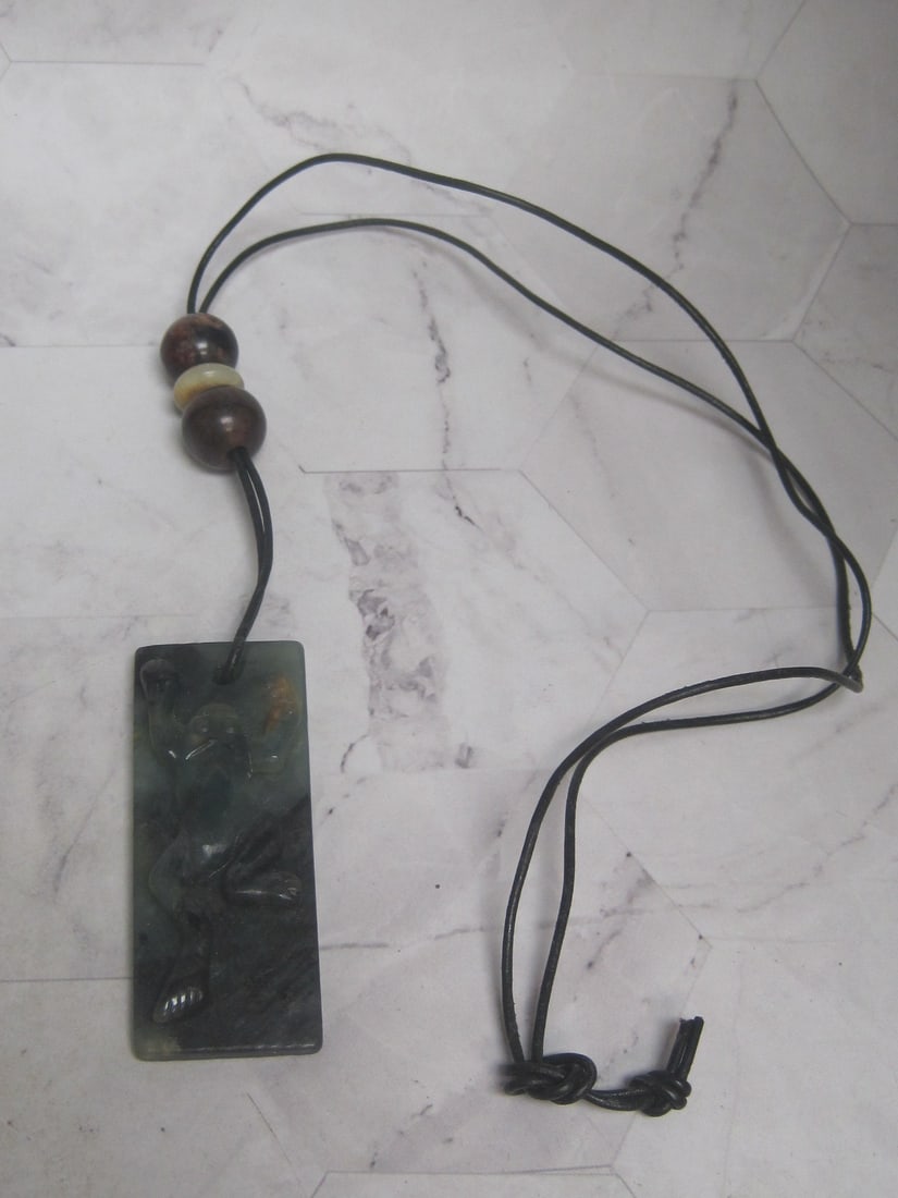 Carved Jade Pendant on 36" Leather Cord Necklace with Accent Beads: . 