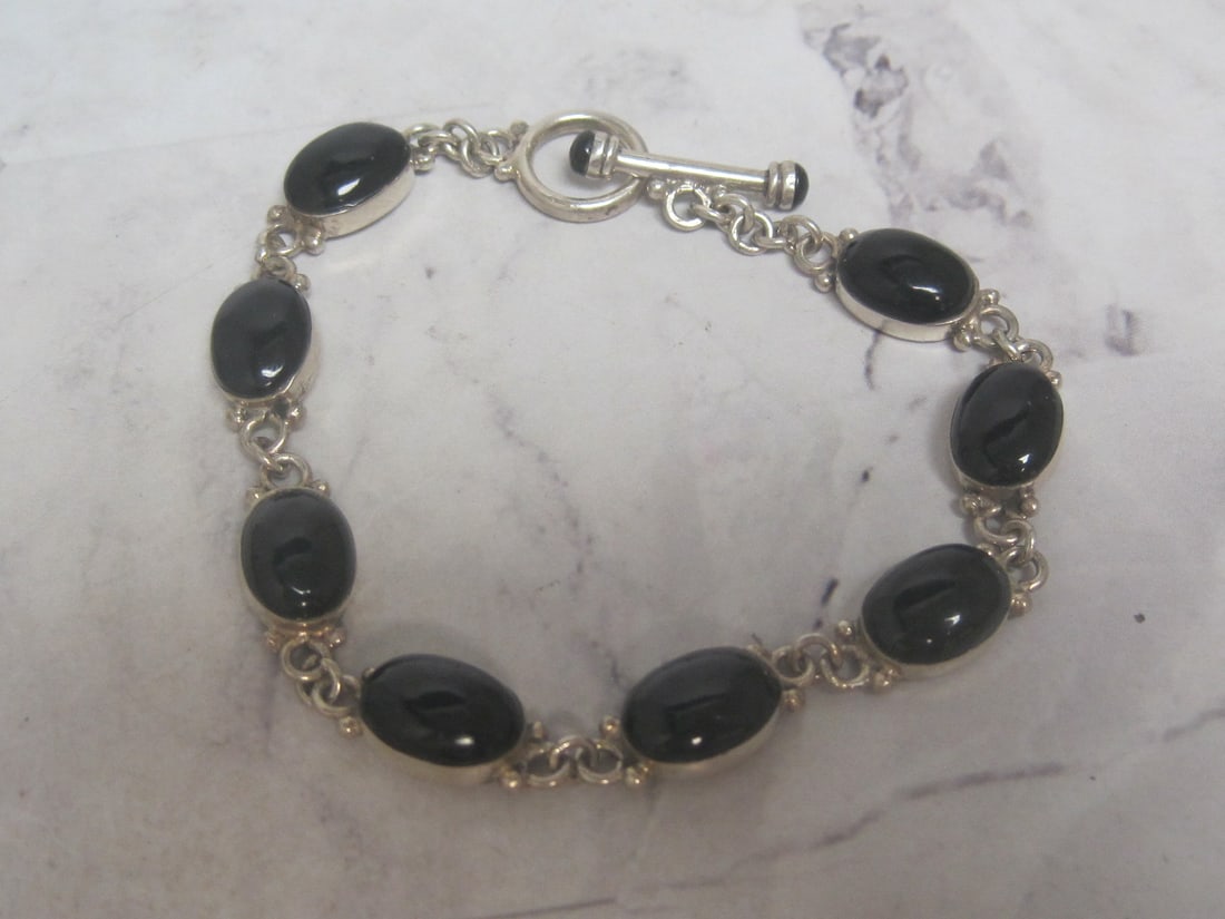 7 1/2" Sterling Silver Onyx Bracelet: Weighs 10.8 grams 