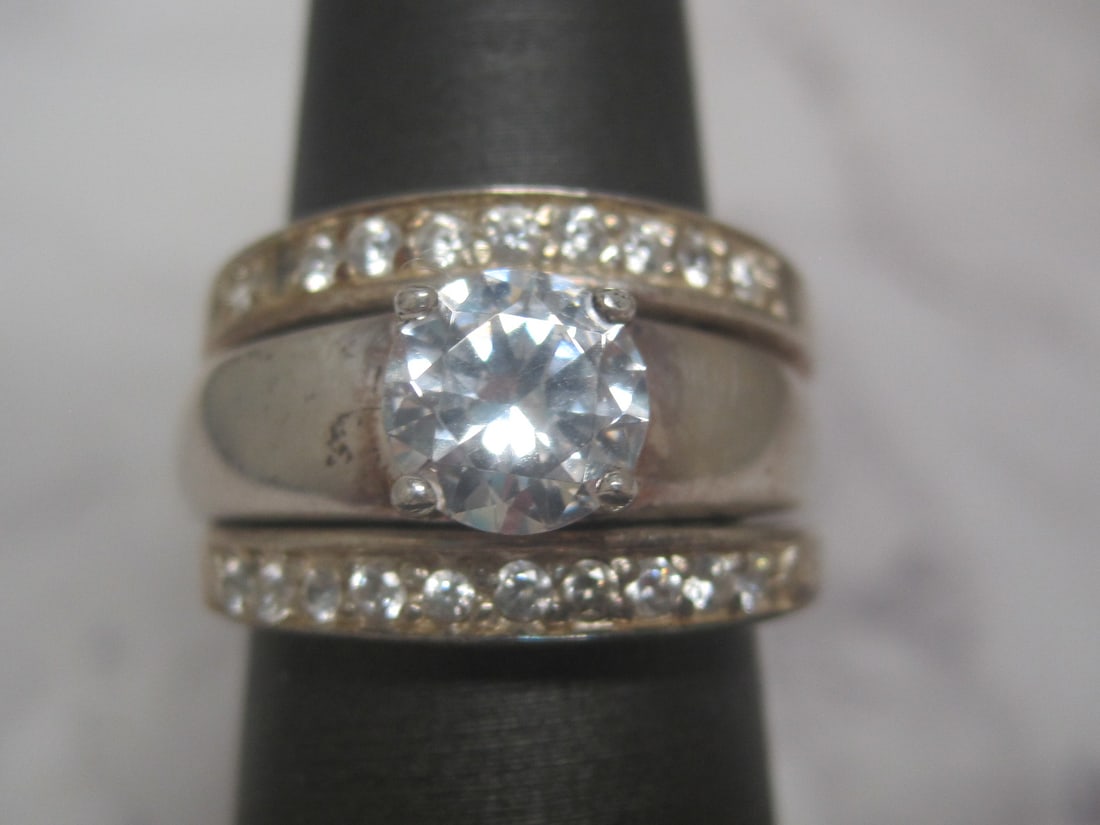 Sterling Silver CZ Wedding Set: Weighs 10.6 grams, Size 6. CZ band & CZ guard ring 