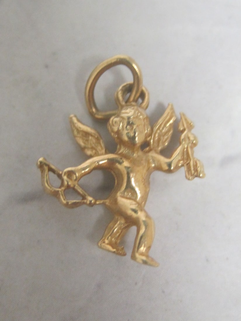 14k Gold Cupid Pendant: Weighs 1.9 grams 