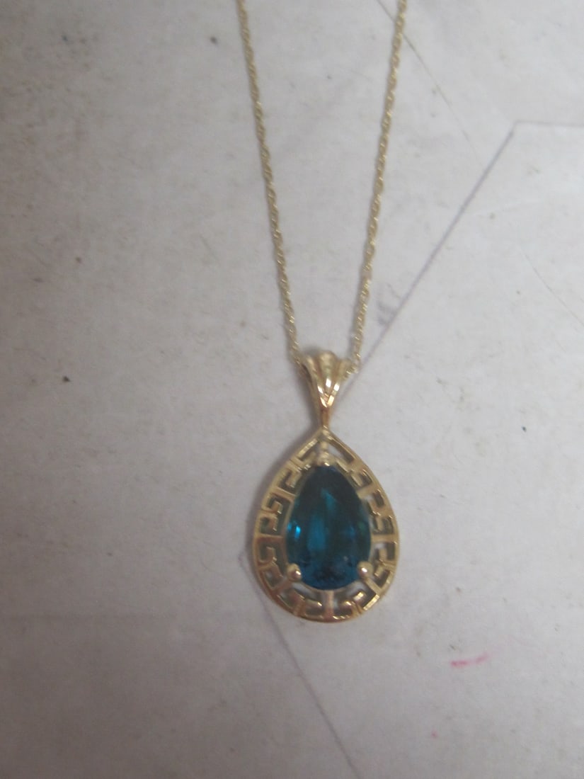 10k Gold Green Tourmaline Greek Key Pendant on 18" 10k Gold Chain: Stone Possibly Synthetic. Weighs 1.5 grams