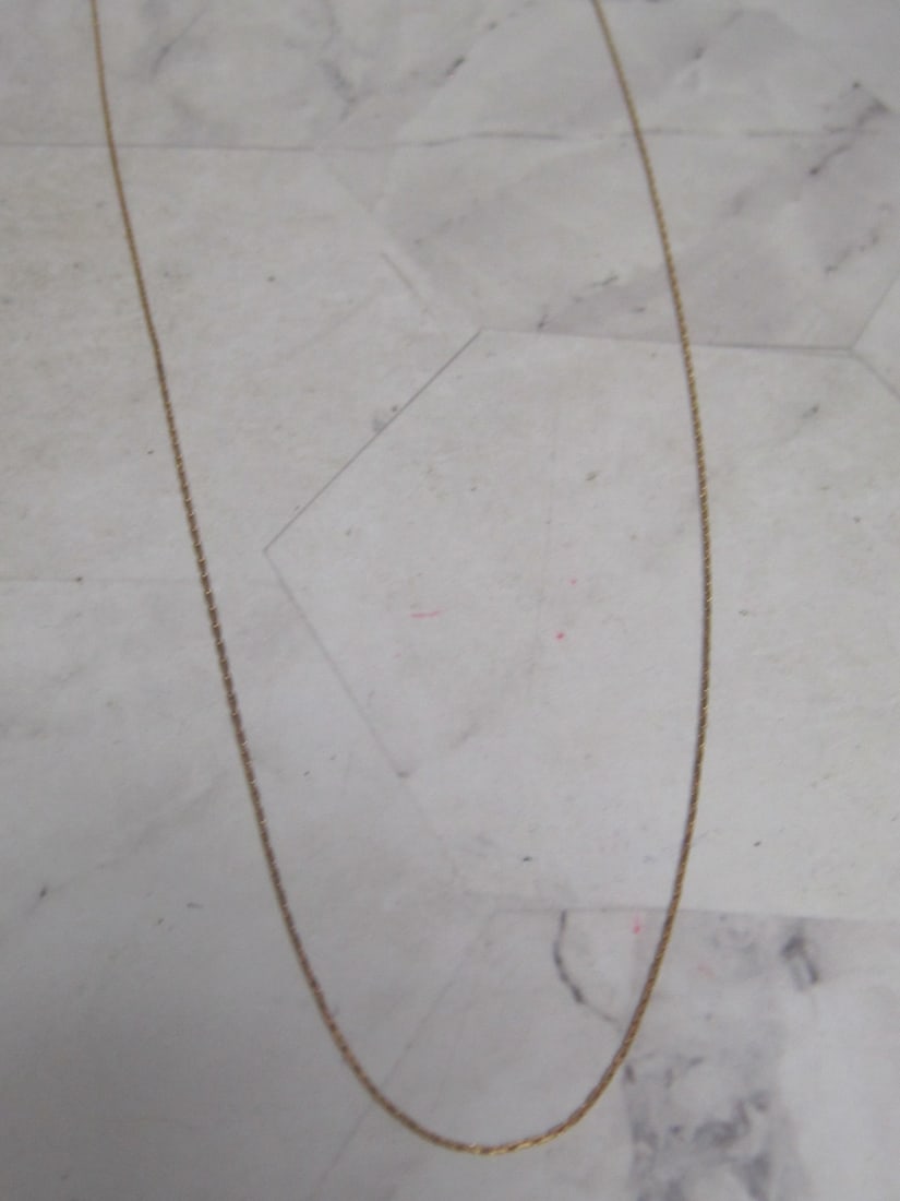 28" 14K Gold Chain: Weighs 2.4 grams