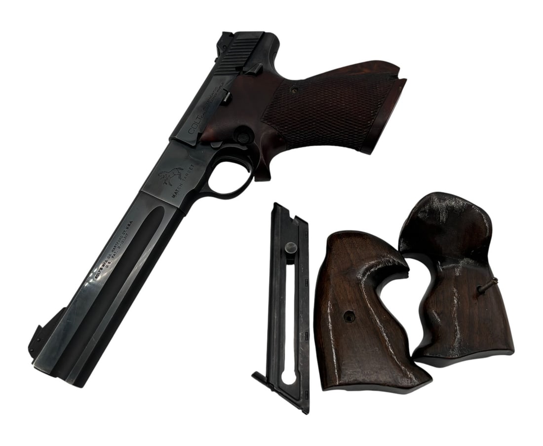 1951 Colt Woodsman Match Target .22 LR Semi-Automatic "Former FBI" Gun w/ Grips and Mag: S#: 89184-S | 6" Barrel | Adjustable target sights | Very nice lefthanded target checkered grips | Comes with (2) original Colt marked magazines | Also comes with original right hand grips | Per