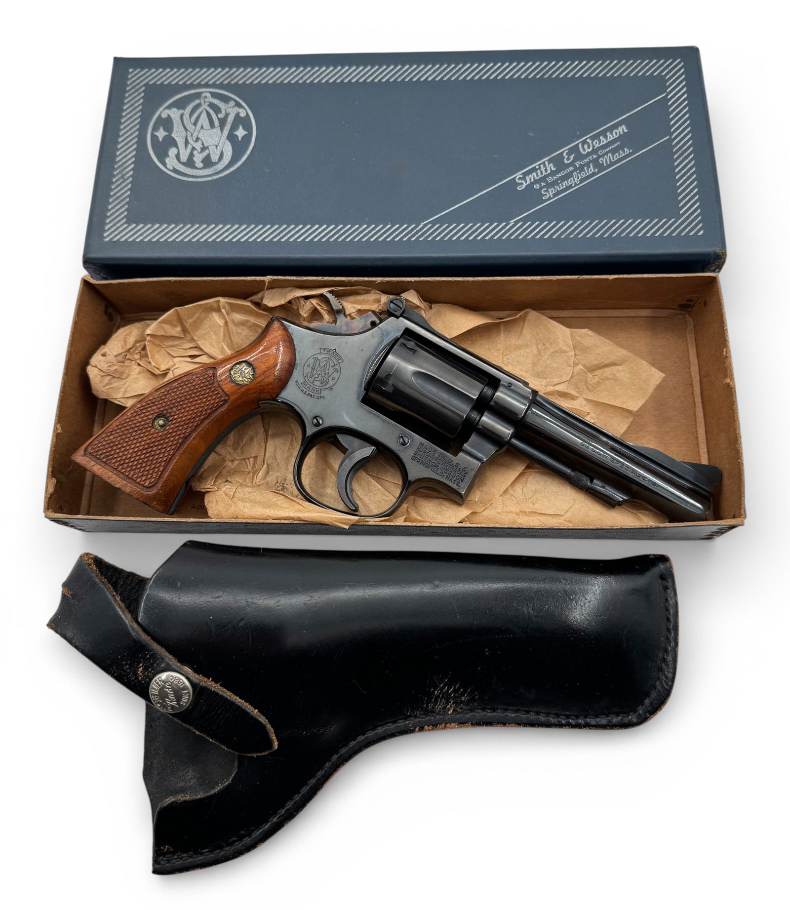 Excellent 1969 Smith & Wesson 15-3 K38 Combat Masterpiece .38 SPECIAL Revolver w/ Holster: S#: K914364 | Mfg. 1969 | Matching serial number stamped on frame and on bottom of grip | 4” Pinned Barrel | 6-Shot, SA/DA | Target sights with trigger shoe and spur hammer | Wood checkered magm