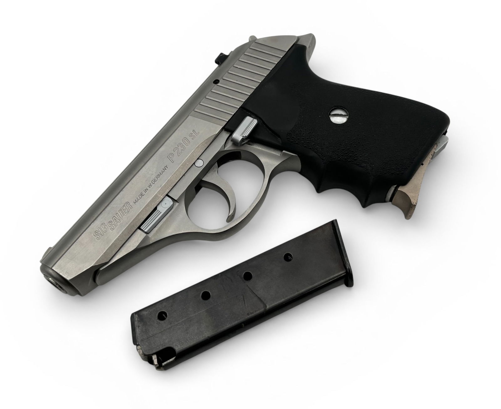 West German Sig Sauer Mod P230SL .380 ACP SS Semi-Automatic 'Former NC SBI' Pistol w/(2) Mags: S#: S047038 | Date Code: KE | Stainless steel finish | Comes with (1) stainless Sig Sauer factory zigzag back magazine and (1) unmarked blued magazine | Known as the Sig Space pistol, this is a nice