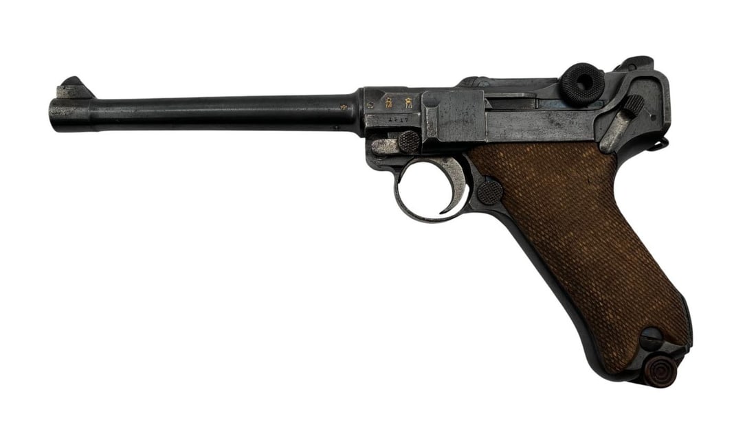 Excellent Rare WWI Imperial German “1917” DWM Model 1914 Navy P.08 Luger 9mm Pistol: S#: 1369A, matching on frame, barrel and on the back, with several internal small parts also matching | 6" Barrel | Comes with (1) unmarked wood base magazine | Features crown/M proof marks on left