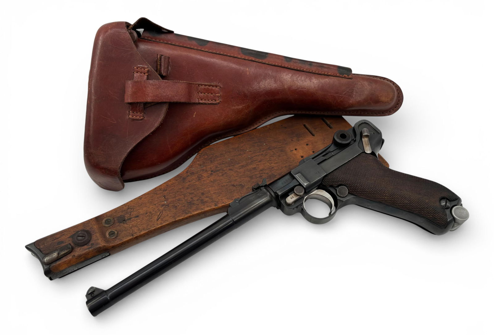 RARE Early WWI German 1914 Erfurt Artillery Luger LP-08 9mm Semi-Automatic Pistol Rig: S#: 6986 | Matching on almost all of the parts | 7-7/8" Barrel with adjustable sight that goes from 1-8 | The side plate is stamped 98, most likely from a dyslexic armorer, however the extractor is