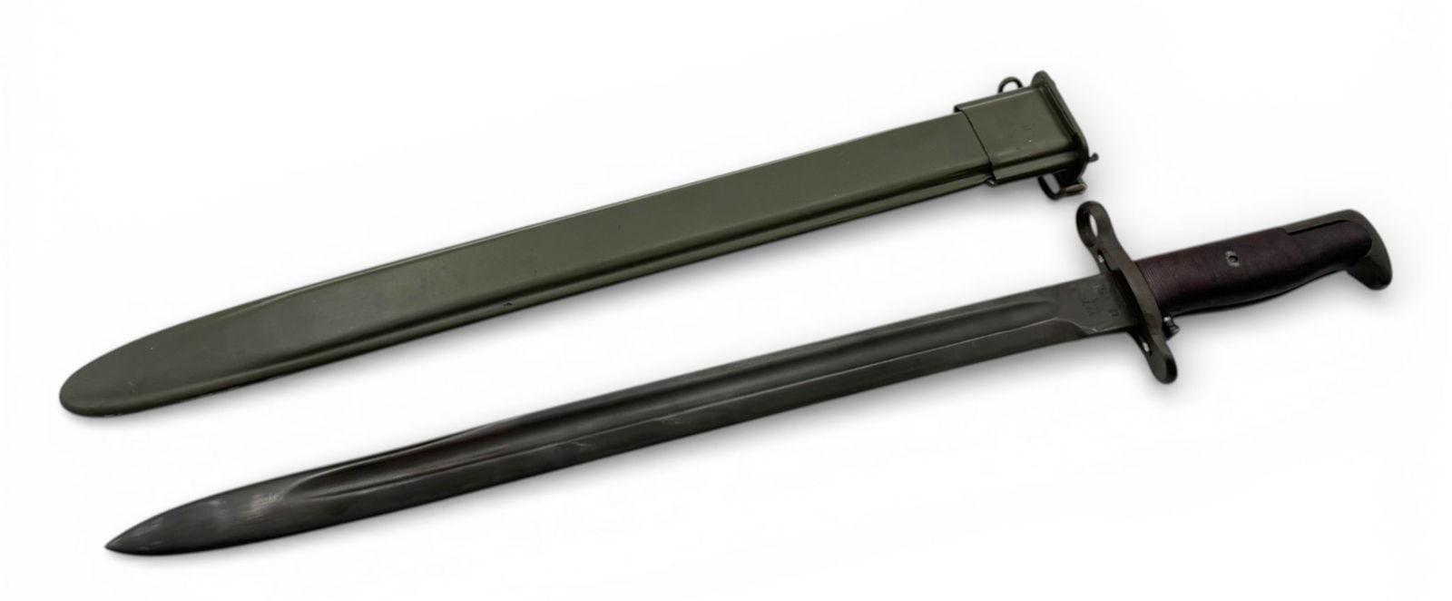 16" M1 Garand Bayonet by Wilde Tool dated 1942 with Scabbard: 16" Blade, Refinished, comes with scabbard. Push button locking mechanism works good. Buyer be your own judge of authenticity. See photos. 