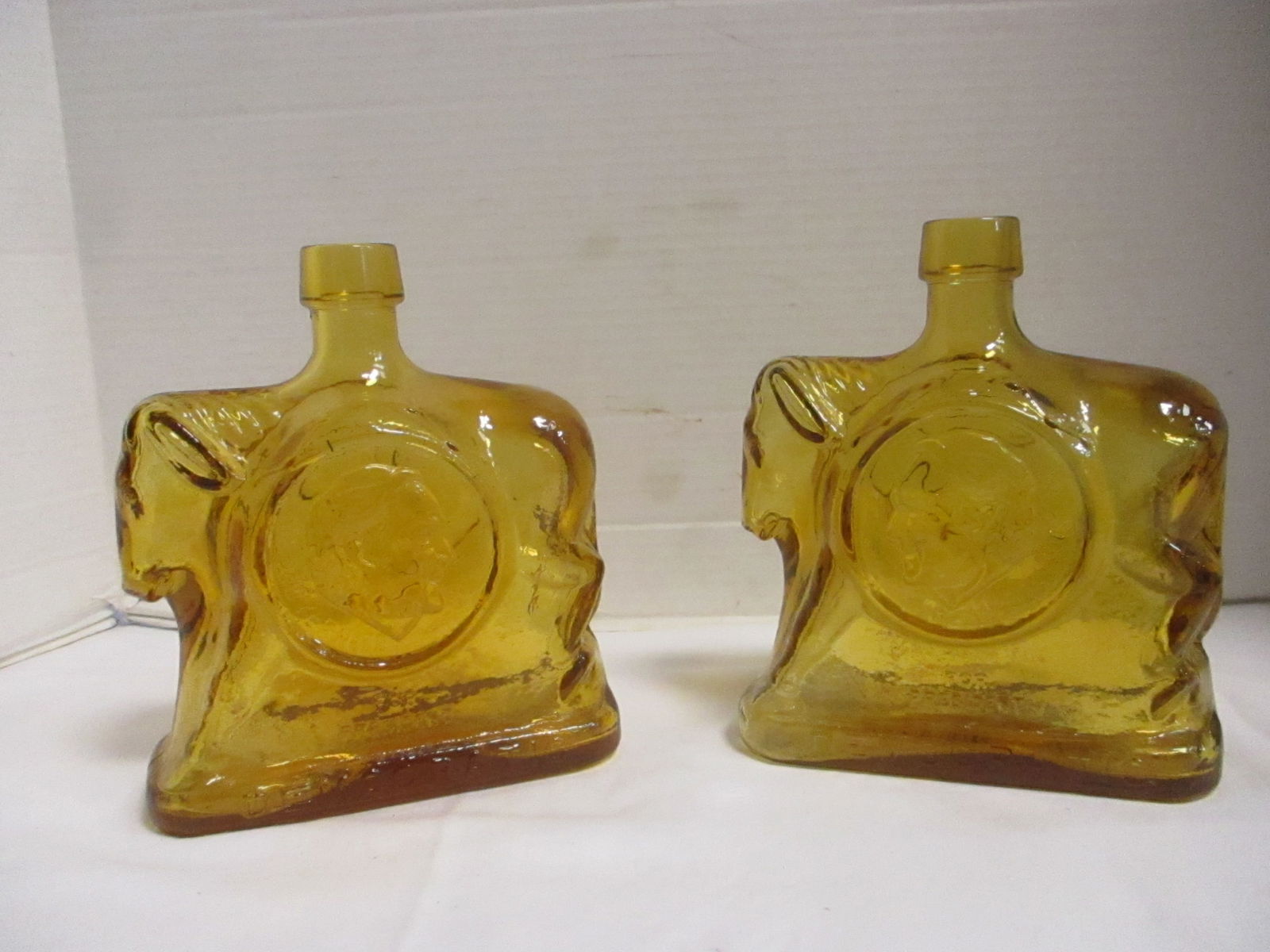 Two 1972 Wheaton Amber Color McGovern Campaign Commemorative Decanters: 7"h, One McGovern President Shriver Vice President, One McGovern President Eagleton Vice President(small chip)