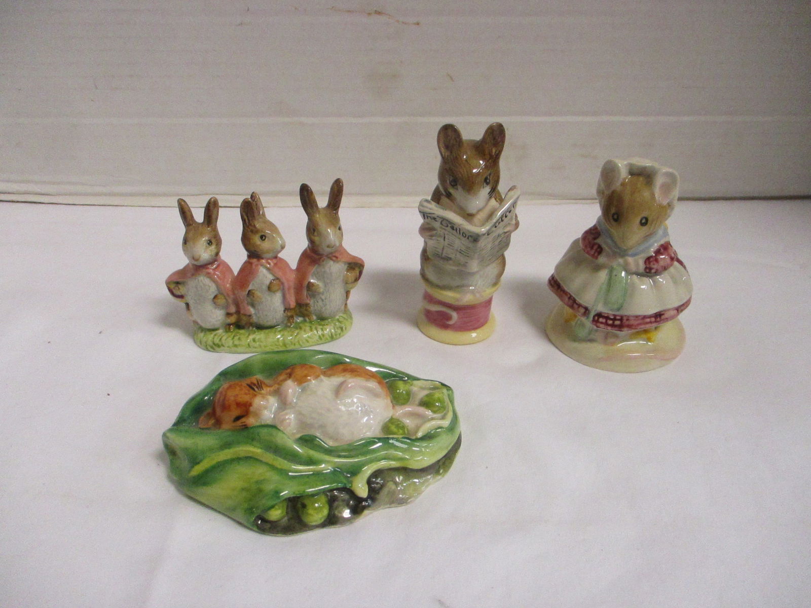 Four Beatrix Potter Porcelain Figurines (1 of 12)