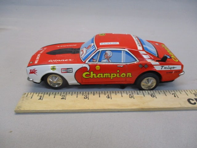 1970's/80's Champion Non-Fall Mystery Bump-N-Go Tin Toy - 12