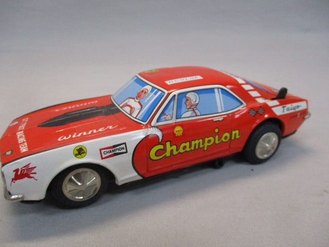 1970's/80's Champion Non-Fall Mystery Bump-N-Go Tin Toy - 3