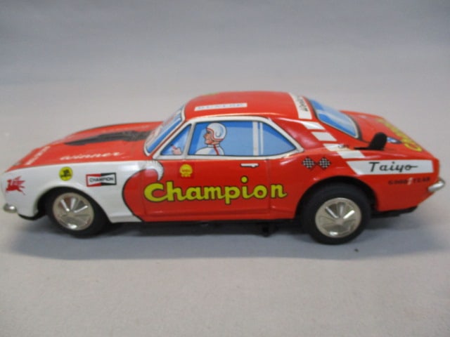 1970's/80's Champion Non-Fall Mystery Bump-N-Go Tin Toy - 4