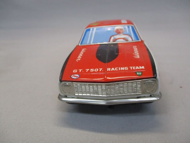 1970's/80's Champion Non-Fall Mystery Bump-N-Go Tin Toy - 5