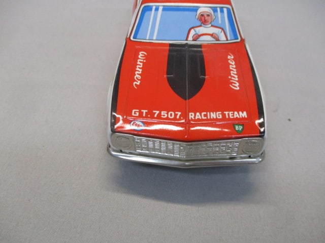 1970's/80's Champion Non-Fall Mystery Bump-N-Go Tin Toy - 6