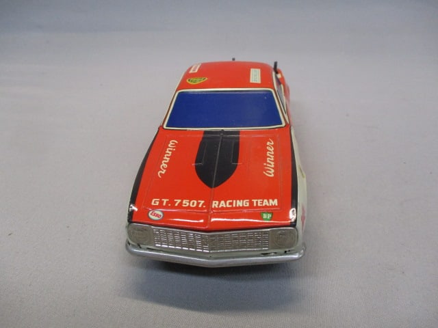 1970's/80's Champion Non-Fall Mystery Bump-N-Go Tin Toy - 4