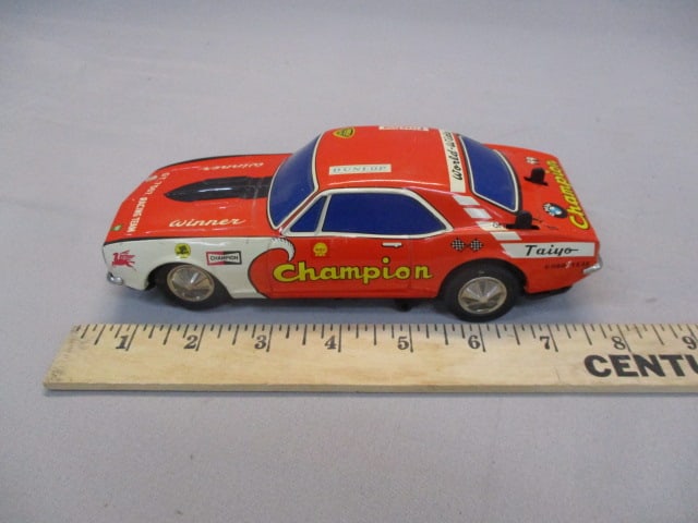 1970's/80's Champion Non-Fall Mystery Bump-N-Go Tin Toy - 9