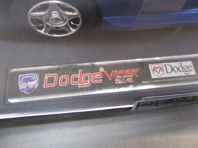 7 Diecast Cars in Display Cases - See All Pictures - 7